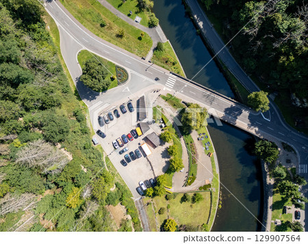 Esch-sur-Sure, Wiltz, Grand-Duche de Luxembourg, August 10, 2025, A stunning aerial view showcases 129907564