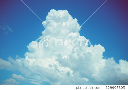 Midsummer sun and cloud cover 129907805