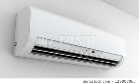 Modern air conditioner hanging on white wall providing cooling comfort 129908063