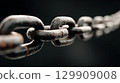 Rusty metal chain on black background 129909008