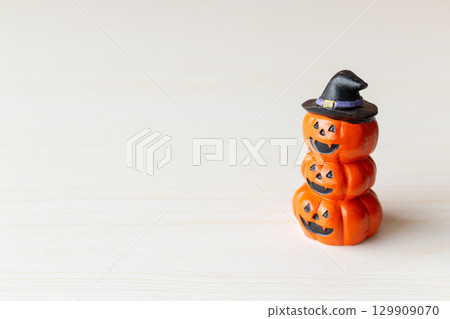 Halloween Pumpkin Figurine with Witch Hat Isolated Halloween Pumpkin Figurine with Witch Hat Isolated 129909070