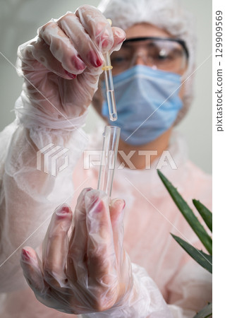 Researcher Conducts Study on Aloe Plant Extract Applications in a Laboratory Setting 129909569
