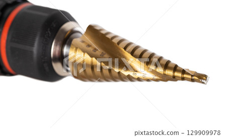 New step drill in screwdriver on white background, isolate. Concept of tools, close-up New step drill in screwdriver on white background, isolate. Concept of tools, close-up 129909978