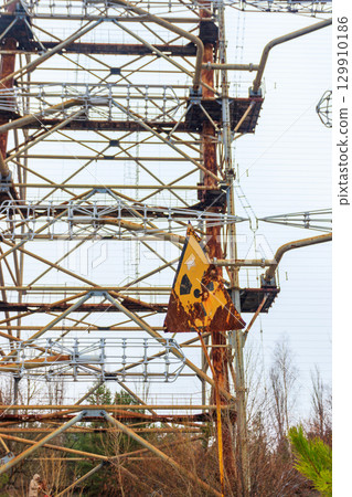 Radiation warning sign in front of Duga, a Soviet over-the-horizon (OTH) radar system as part of the Soviet anti-ballistic missile early-warning network, inside the Chernobyl Exclusion Zone in Ukraine Radiation warning sign in front of Duga, a Soviet over-the-horizon (OTH) radar system as part of the Soviet anti-ballistic missile early-warning network, inside the Chernobyl Exclusion Zone in Ukraine 129910186