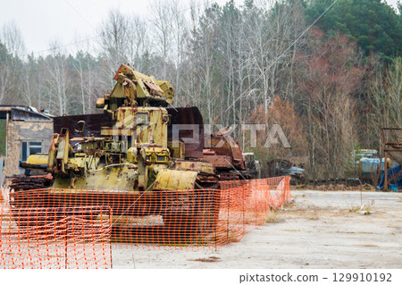 Old rusty abandoned military vehicle in Chernobyl exclusion zone, Ukraine 129910192