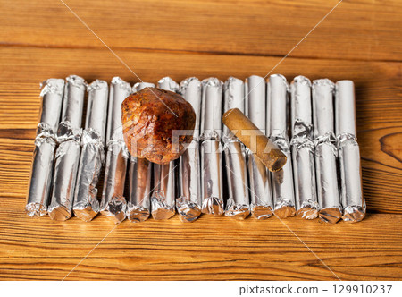 Propolis vaginal suppository for pain and swelling relief in gynecology, antimicrobial, close-up Propolis vaginal suppository for pain and swelling relief in gynecology, antimicrobial, close-up 129910237