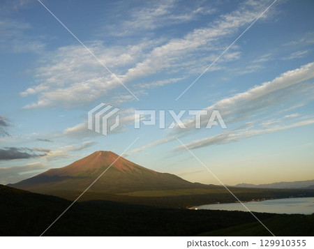 Red Fuji in the summer with a beautiful morning glow 129910355