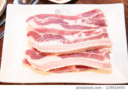Korean pork barbecue. raw pork belly 129910493