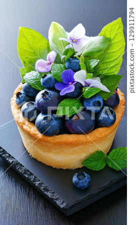 Delicious blueberry pie, closeup. Delicious sweet pastry with berries. AI Generated. Delicious blueberry pie, closeup. Delicious sweet pastry with berries. AI Generated. 129911794