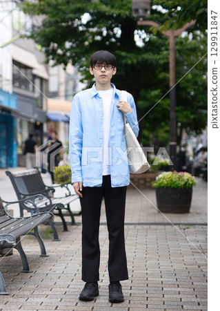 Young men walking in the city Young men walking in the city 129911847