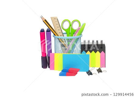 School and office supplies, pens, pencils, ruler, compass in a metal cup on a white background 129914456
