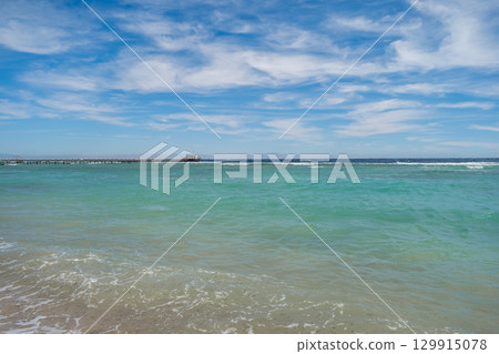 Vibrant turquoise waters and serene skies near the Egyptian coast 129915078