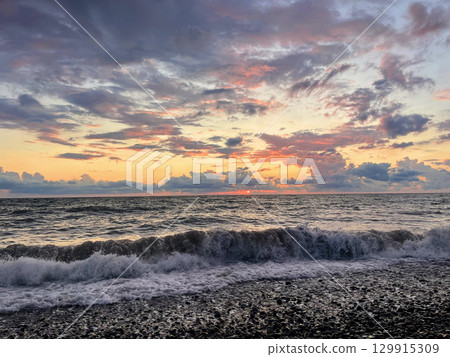 Colorful landscape with sea sunset on beach Colorful landscape with sea sunset on beach 129915309
