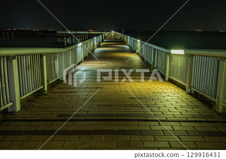 A promenade jutting out onto the lake, on the shores of Lake Biwa in Otsu City A promenade jutting out onto the lake, on the shores of Lake Biwa in Otsu City 129916431