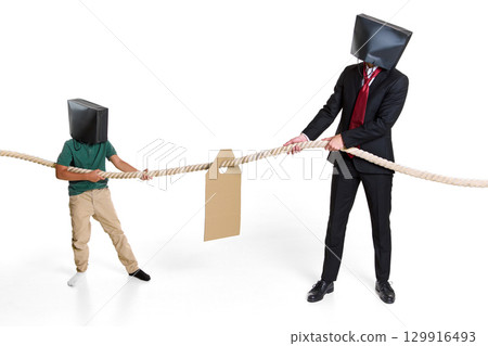Man and boy with shopping bags on heads pulling rope with price tag Man and boy with shopping bags on heads pulling rope with price tag 129916493