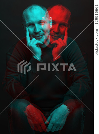 Happy man with sweatshirt studio portrait in glitch and RGB color split effect style 129916661