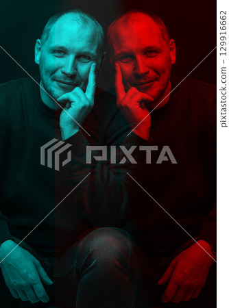 Happy man with sweatshirt studio portrait in glitch and RGB color split effect style 129916662