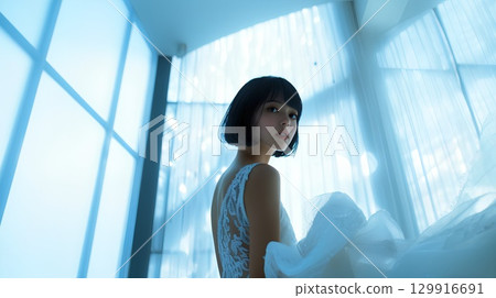 A woman in a dress 129916691