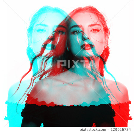 Beautiful woman with long wavy flying hair sensual studio portrait in RGB color split effect style 129916724