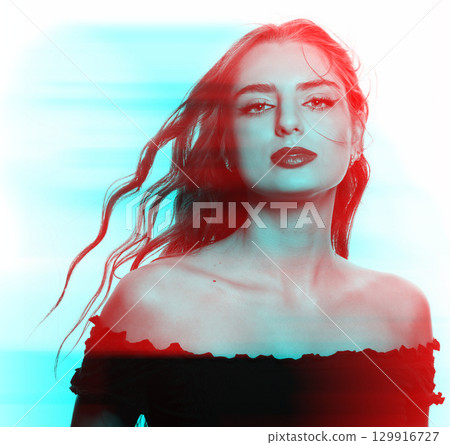 Beautiful woman with long wavy flying hair sensual studio portrait in RGB color split effect style 129916727