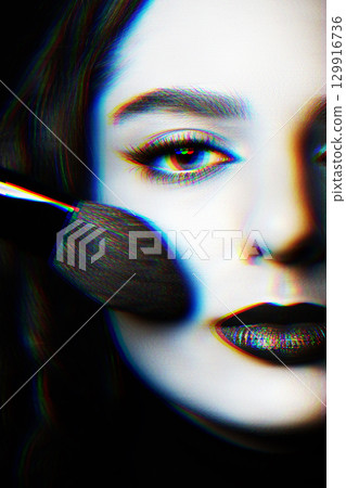Beautiful woman with make-up and dark lips studio portrait in RGB color split effect style 129916736