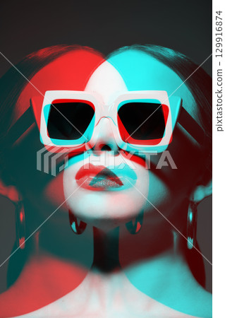 Woman portrait with classic hairstyle, big retro sunglasses and earrings in RGB color split effect style Woman portrait with classic hairstyle, big retro sunglasses and earrings in RGB color split effect style 129916874