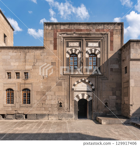 Gevher Nesibe Madrasa, or Kayseri Ethnography Museum, in Kayseri, Turkey. Historic Seljuk architecture with ornate windows and arched entrance 129917406