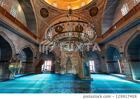 Architectural interior of Kursunlu Mosque, Turkish: Kursunlu Camii, with chandelier, mihrab, and minbar, Kayseri, Turkey 129917408