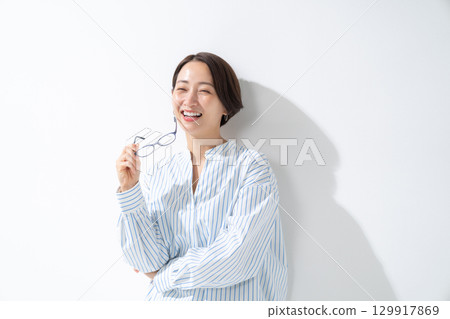 Woman with glasses Woman with glasses 129917869