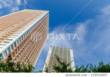 Blue sky and skyscraper Blue sky and skyscraper 129918007