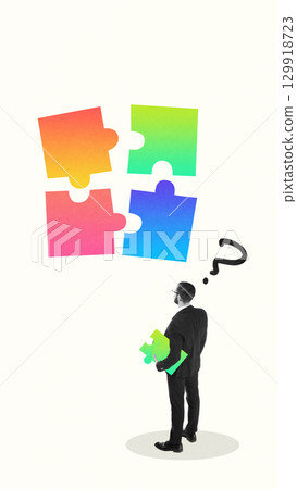 Trendy collage with businessman holding puzzle piece facing floating colorful puzzle 129918723