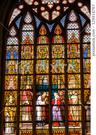 Stained glass windows in the Roman Catholic Cathedral of St. Michael and St. Gudula in central Brussels, Belgium Stained glass windows in the Roman Catholic Cathedral of St. Michael and St. Gudula in central Brussels, Belgium 129918767