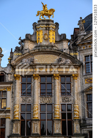 Lavishly decorated facades and architectural details of Guildhalls on the Grand-Place Grote Markt square of Brussels, Belgium Lavishly decorated facades and architectural details of Guildhalls on the Grand-Place Grote Markt square of Brussels, Belgium 129918833