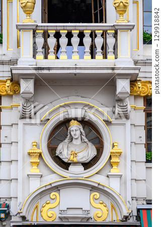 Lavishly decorated facades and architectural details of Guildhalls on the Grand-Place Grote Markt square of Brussels, Belgium Lavishly decorated facades and architectural details of Guildhalls on the Grand-Place Grote Markt square of Brussels, Belgium 129918842