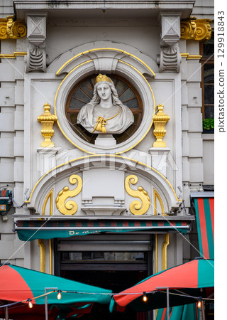 Lavishly decorated facades and architectural details of Guildhalls on the Grand-Place Grote Markt square of Brussels, Belgium Lavishly decorated facades and architectural details of Guildhalls on the Grand-Place Grote Markt square of Brussels, Belgium 129918843