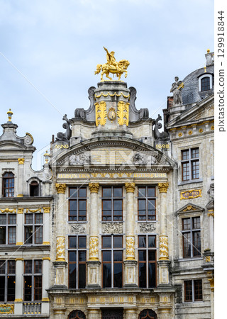 Lavishly decorated facades and architectural details of Guildhalls on the Grand-Place Grote Markt square of Brussels, Belgium Lavishly decorated facades and architectural details of Guildhalls on the Grand-Place Grote Markt square of Brussels, Belgium 129918844