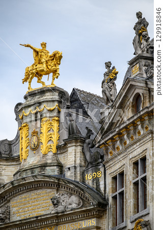 Lavishly decorated facades and architectural details of Guildhalls on the Grand-Place Grote Markt square of Brussels, Belgium Lavishly decorated facades and architectural details of Guildhalls on the Grand-Place Grote Markt square of Brussels, Belgium 129918846