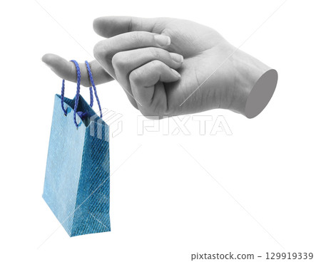 Hand holds mini shopping bag, isolated on transparent background, shopping concept. Contemporary art design Hand holds mini shopping bag, isolated on transparent background, shopping concept. Contemporary art design 129919339