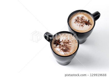 Chai Latte in Black Mug with cinnamon and star anise Chai Latte in Black Mug with cinnamon and star anise 129919688