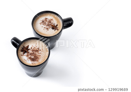 Chai Latte in Black Mug with cinnamon and star anise Chai Latte in Black Mug with cinnamon and star anise 129919689