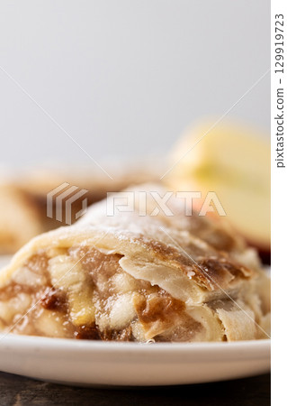 Homemade apple strudel slices Homemade apple strudel slices 129919723