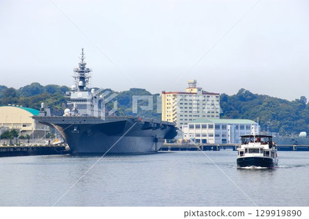 DDH destroyer Kaga docked at the Izumi quay of the Yokosuka naval port. DDH destroyer Kaga docked at the Izumi quay of the Yokosuka naval port. 129919890