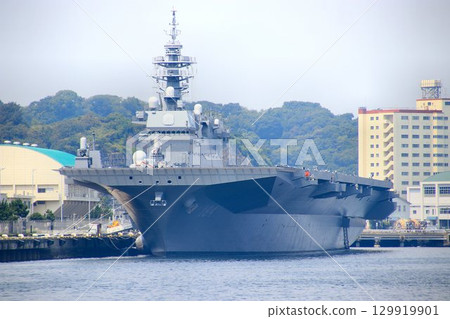 DDH destroyer Kaga docked at the Izumi quay of the Yokosuka naval port. DDH destroyer Kaga docked at the Izumi quay of the Yokosuka naval port. 129919901
