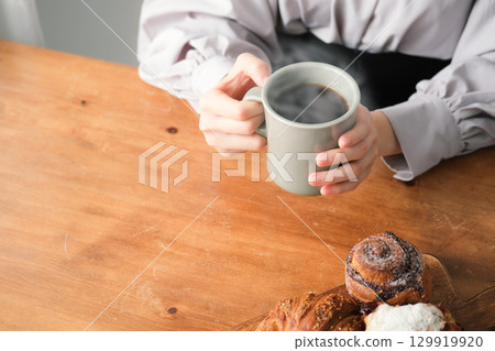 Bread, coffee and a quiet moment Bread, coffee and a quiet moment 129919920