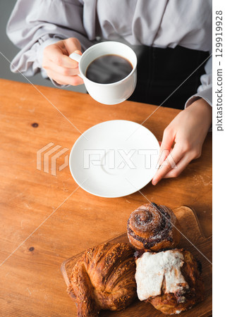 Bread, coffee and a quiet moment Bread, coffee and a quiet moment 129919928