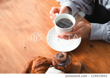 Bread, coffee and a quiet moment 129919942