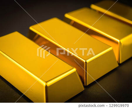 gold bars on a black background gold bars on a black background 129919970