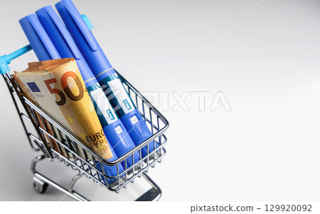 Buying ozempic diabetes treatment in supermarket cart 129920092
