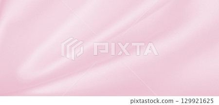 Smooth elegant pink silk or satin texture as wedding background. Luxurious valentine day background design 129921625