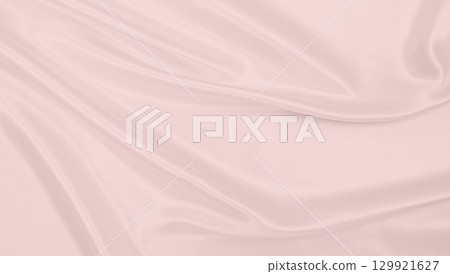 Smooth elegant pink silk or satin texture as wedding background. Luxurious background design Smooth elegant pink silk or satin texture as wedding background. Luxurious background design 129921627